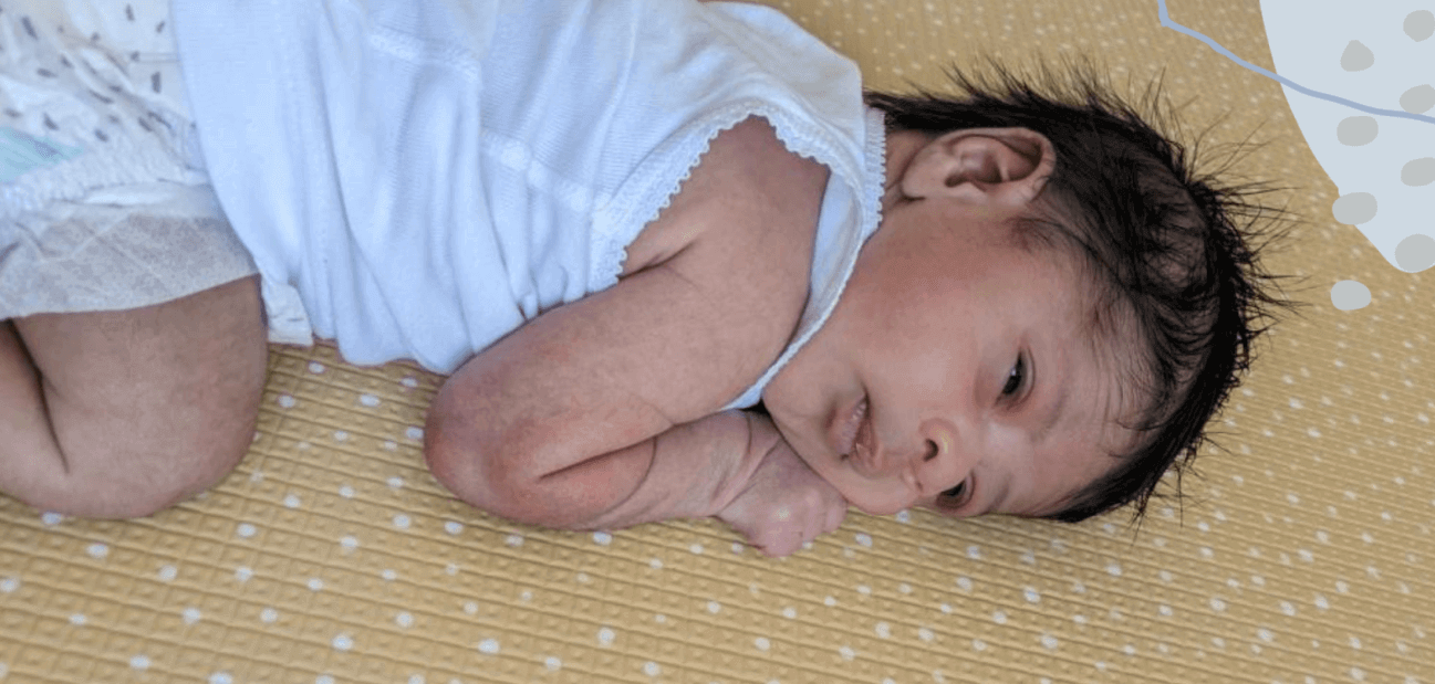 Baby practising tummy time